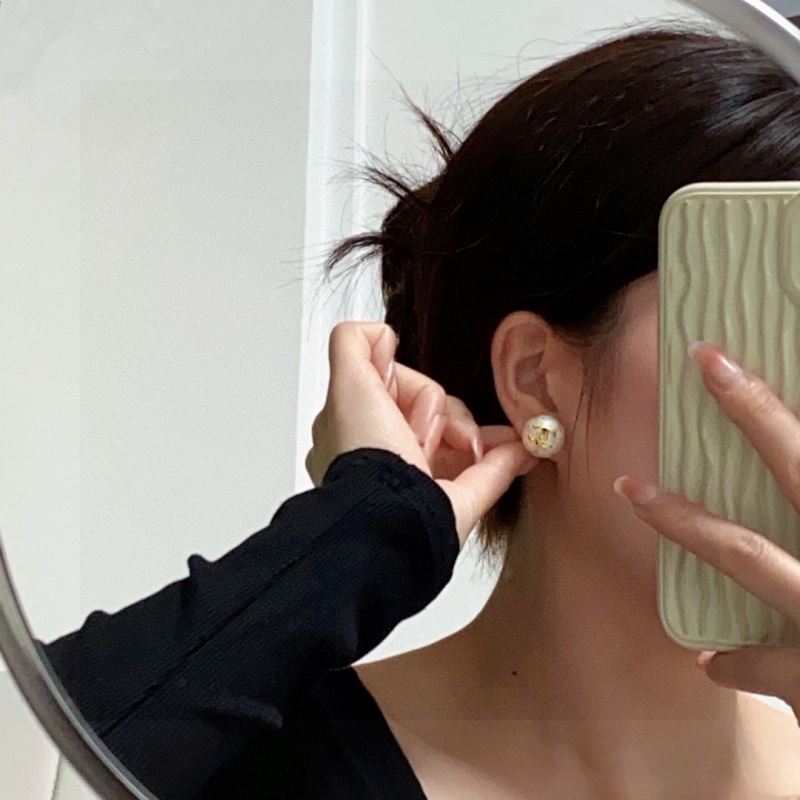 Ch*el earrings